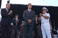 US Navy 050529-N-5621B-072 From left, San Diego Mayor Dick Murphy, California Gov. Arnold Schwarzenegger and Cmdr. Ron Ritter applaud World War II veterans.jpg