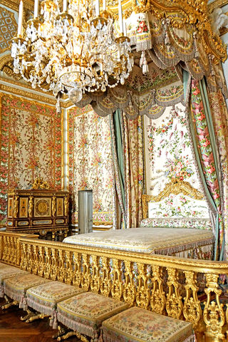 Ložnice francouzské královny Marie Antoinetty na slavném zámku Versailles.