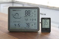 Indoor outdoor thermometers on table-Flickr.jpg