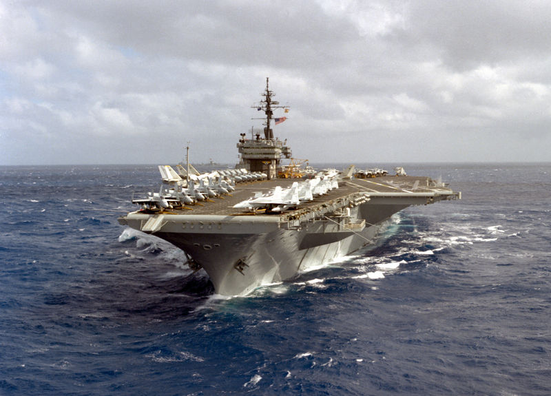 Soubor:A port bow view of the aircraft carrier USS CONSTELLATION (CV-64) underway with various aircraft of the carrier's air wing parked on the flight deck-DPLA.jpeg