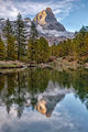 The Matterhorn (Cervinia) at sunset reflected in Lake Blue, just outside the village of Cervinia in Valtournenche, Italy.jpg
