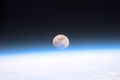 Full moon partially obscured by atmosphere.jpg