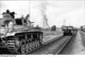 Bundesarchiv Bild 101I-209-0063-17, Lettland, Aiviekste, Panzer III an Bahnstrecke.jpg