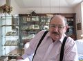 Umberto Eco in his house.JPG