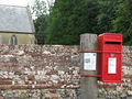 ERII postbox by churchyard wall - geograph.org.uk - 1394877.jpg
