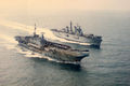 HMS Illustrious steams past HMS Hermes, 20-07-1982-Flickr.jpg
